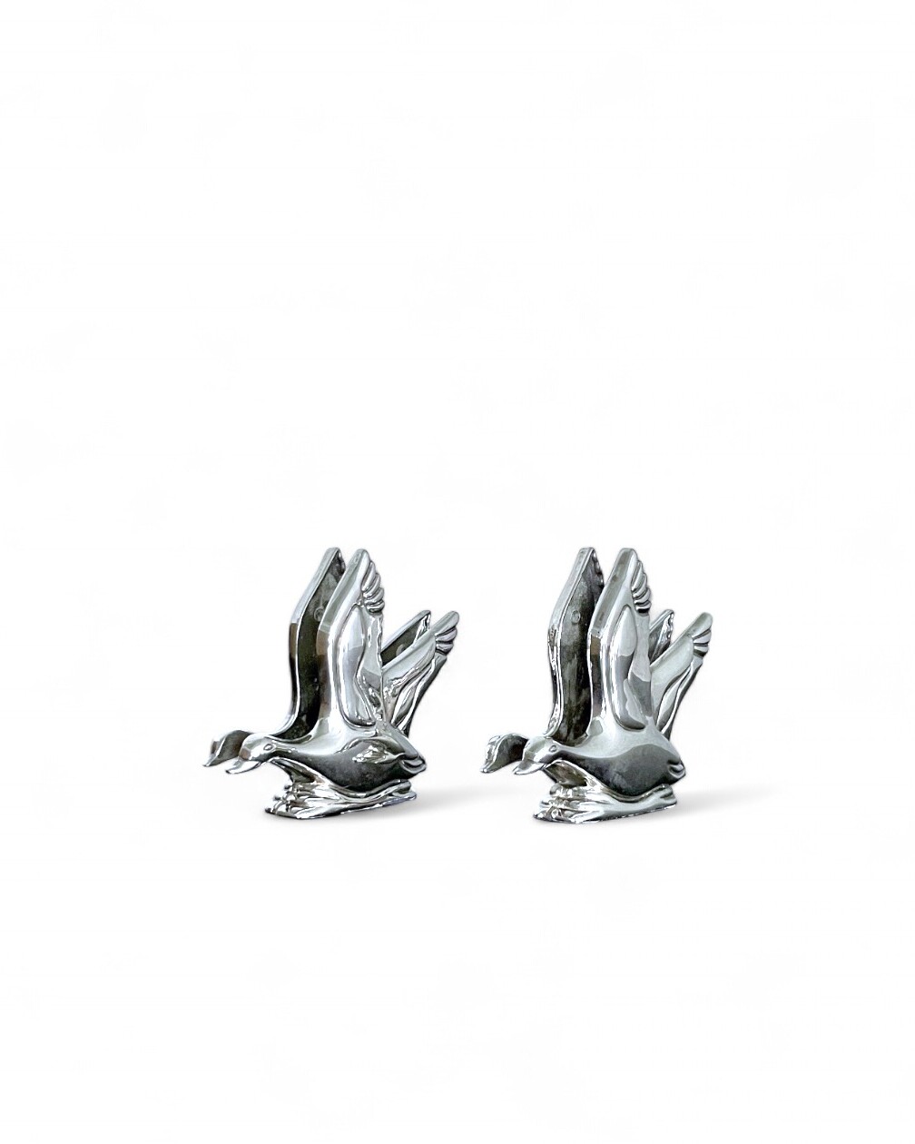 2 silver-plated duck-shaped napkin rings